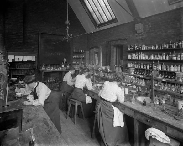 circa 1900: Female undergraduates at work in the laboratory at Girton College, Cambridge University. The college, founded in 1869, was the first for female undergraduates. (Photo by Reinhold Thiele/Thiele/Getty Images)